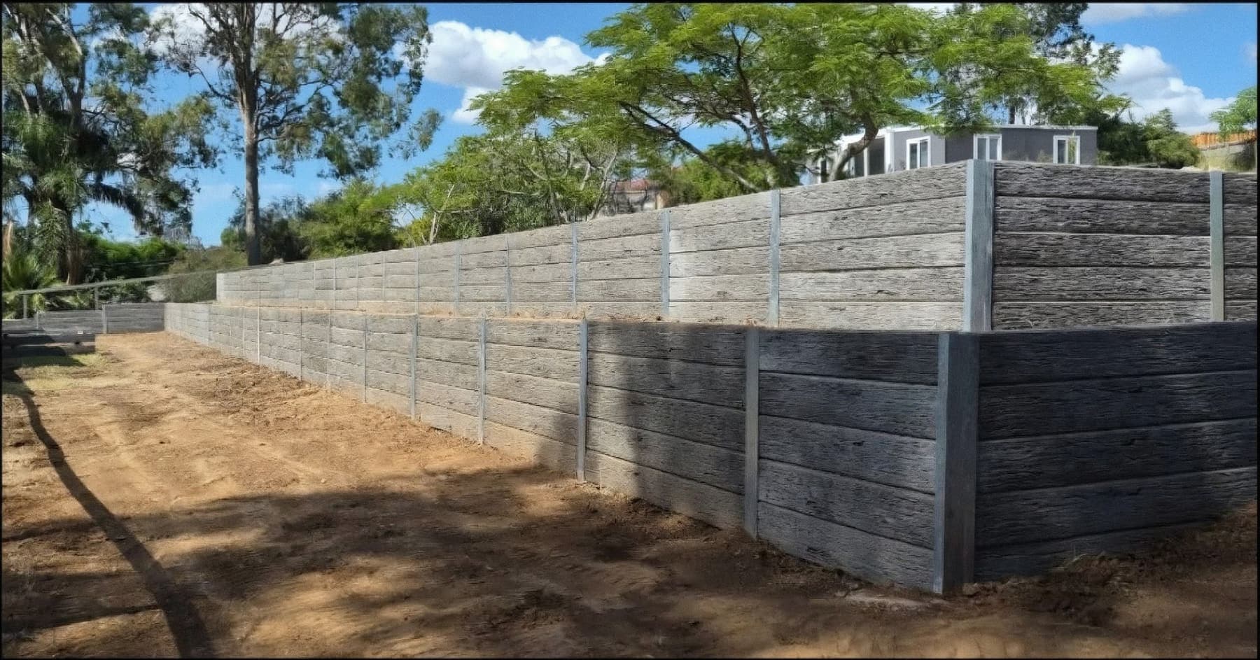 A long concrete sleeper wall at Woodhill